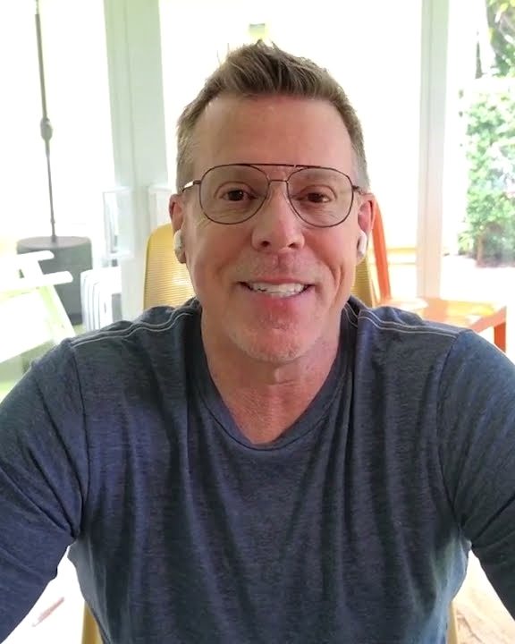 Ron Sacco, founder of Franchise 5, smiling on a video call